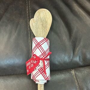 Mixing spoon and dish towel